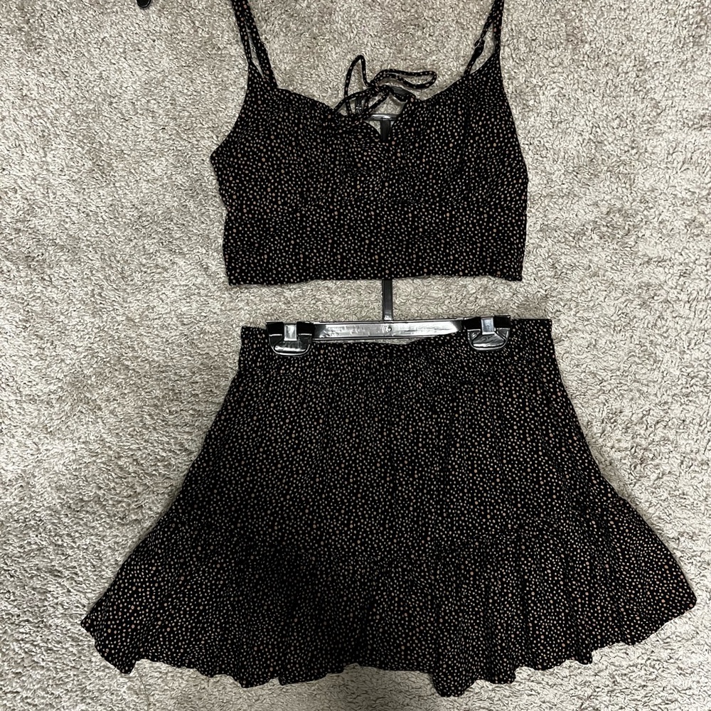 Two piece set. Crop top and skirt. Black with light brown spotted design.
